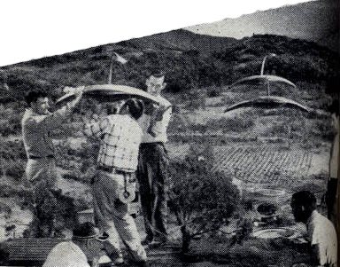 Huge studio set (right) supplies background for much of flying-saucer attack. It represents foothills of Southern    California where movie shows Martians landing.